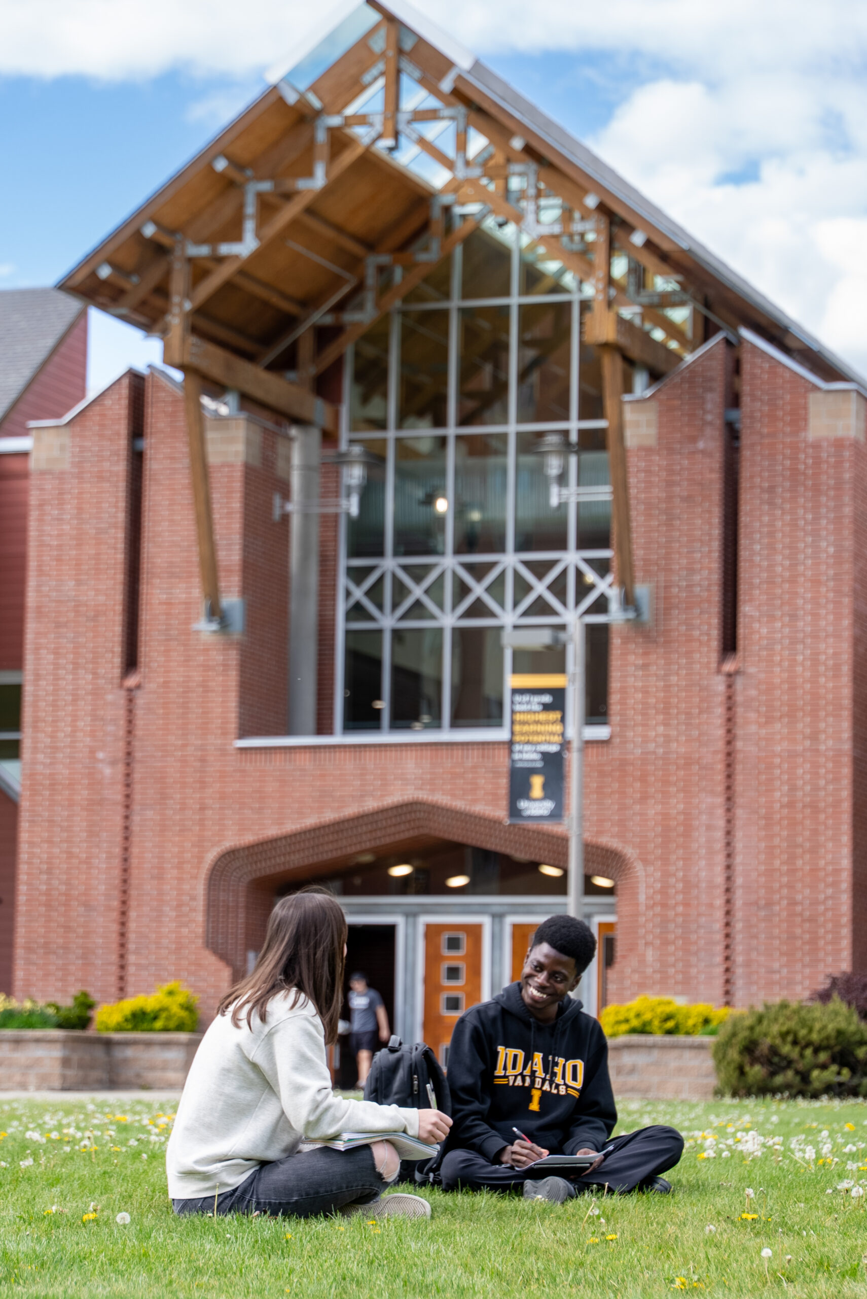 Students study on the lawn outside the Student Recreation Center on Monday, May 5, 2025.