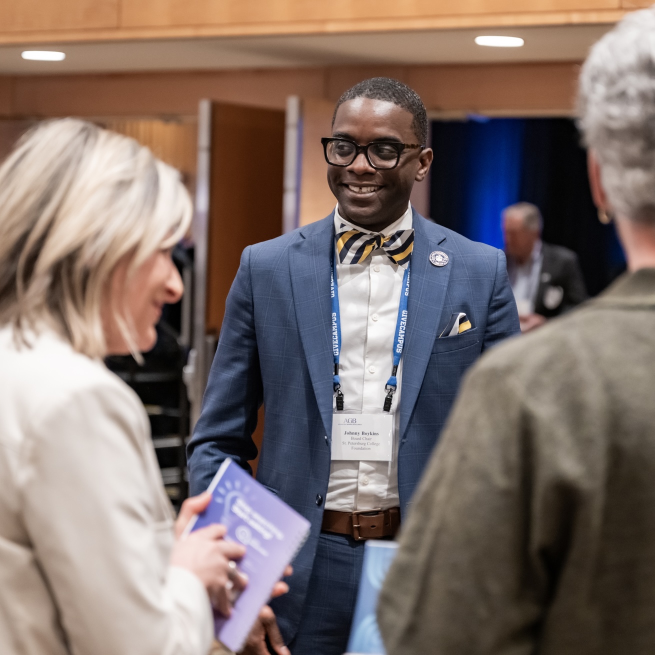 A foundation leader networking.
