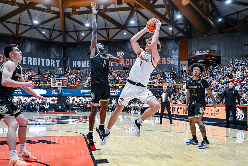 Elias Ralph drives to the hoop and pulls up for a jump shot against Sacramento State on November 29 inside the Alex G. Spanos Center.