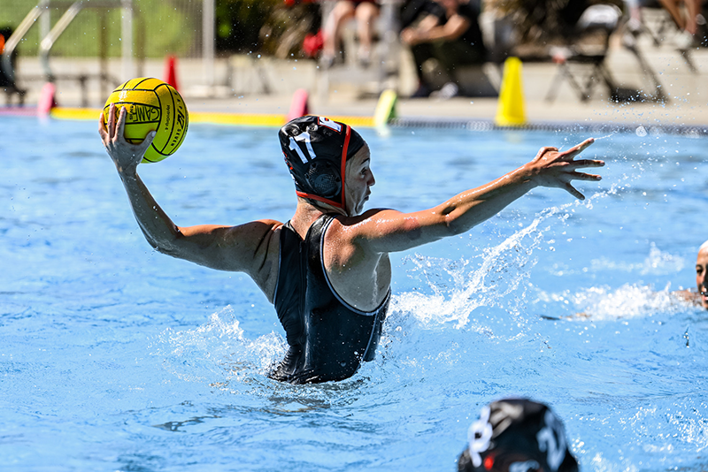 Laia Ortega, Pacific Women’s Water Polo player, gets elevation in the Chris Kjeldsen Pool as she attempts a shot in a women’s water polo match during the 2026 season.