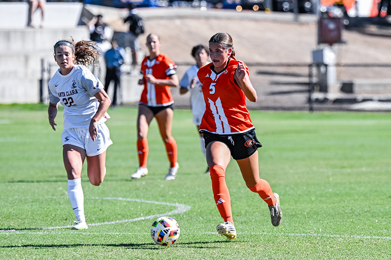 Whitney Garn, Pacific Tigers number 5, dribbles the ball past a defender on Knoles Field during a Women’s Soccer contest at the University of the Pacific.
